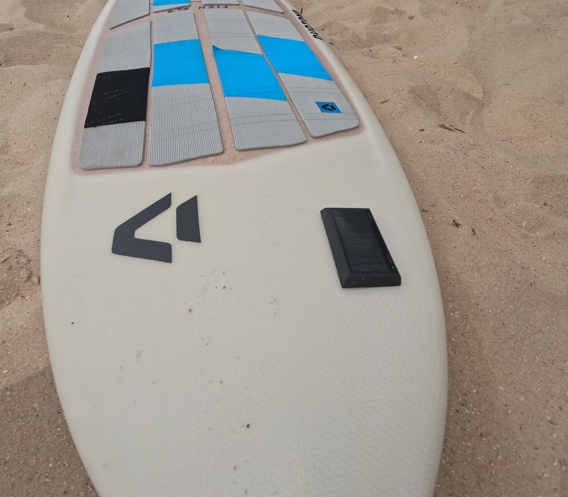 Tracker integrated into the deck of a SmartSurf kiteboard prototype
